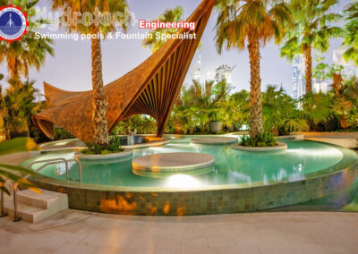 Terraced Pool night view with cabanas